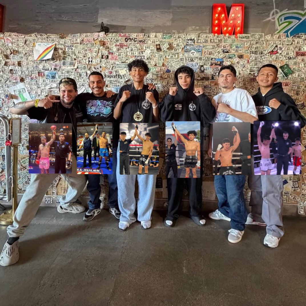 Garden Grove Muay Thai team posing with framed fight photos